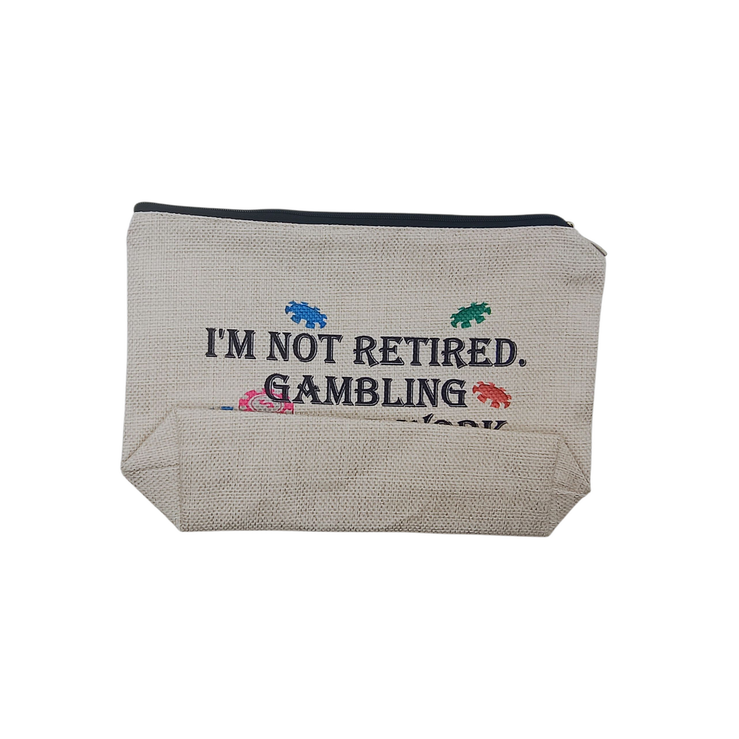 Textile pouch with 'I'm not retired, gambling' text on a white background