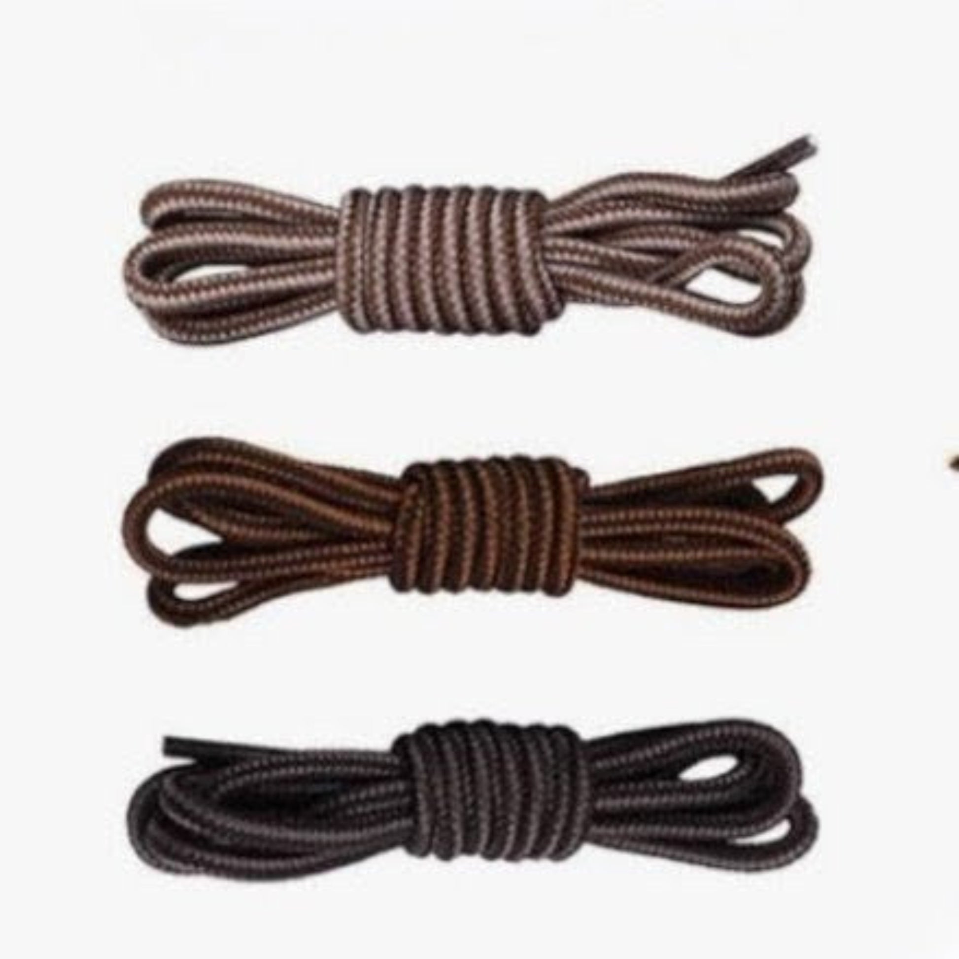 Three pairs of brown shoelaces on a white background