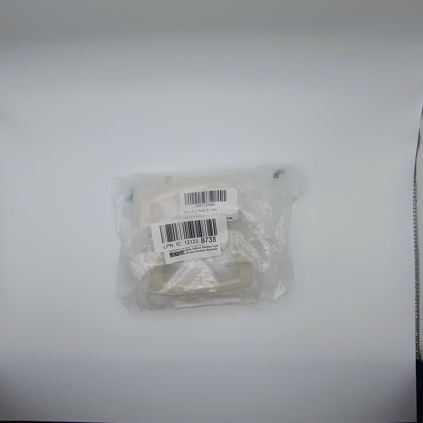 Packaged item with a barcode label on a white background