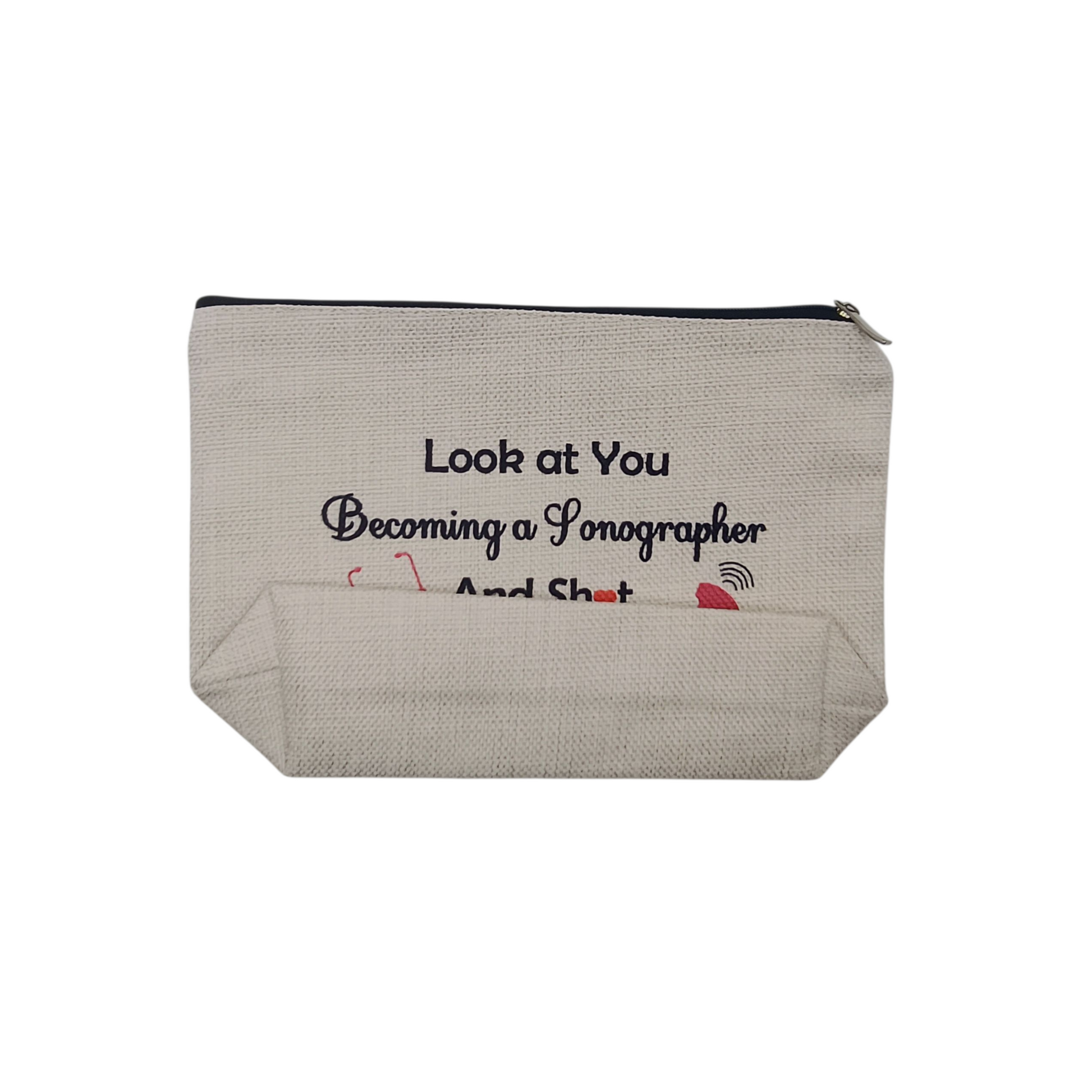 Textile pouch with humorous text and graphics on a white background