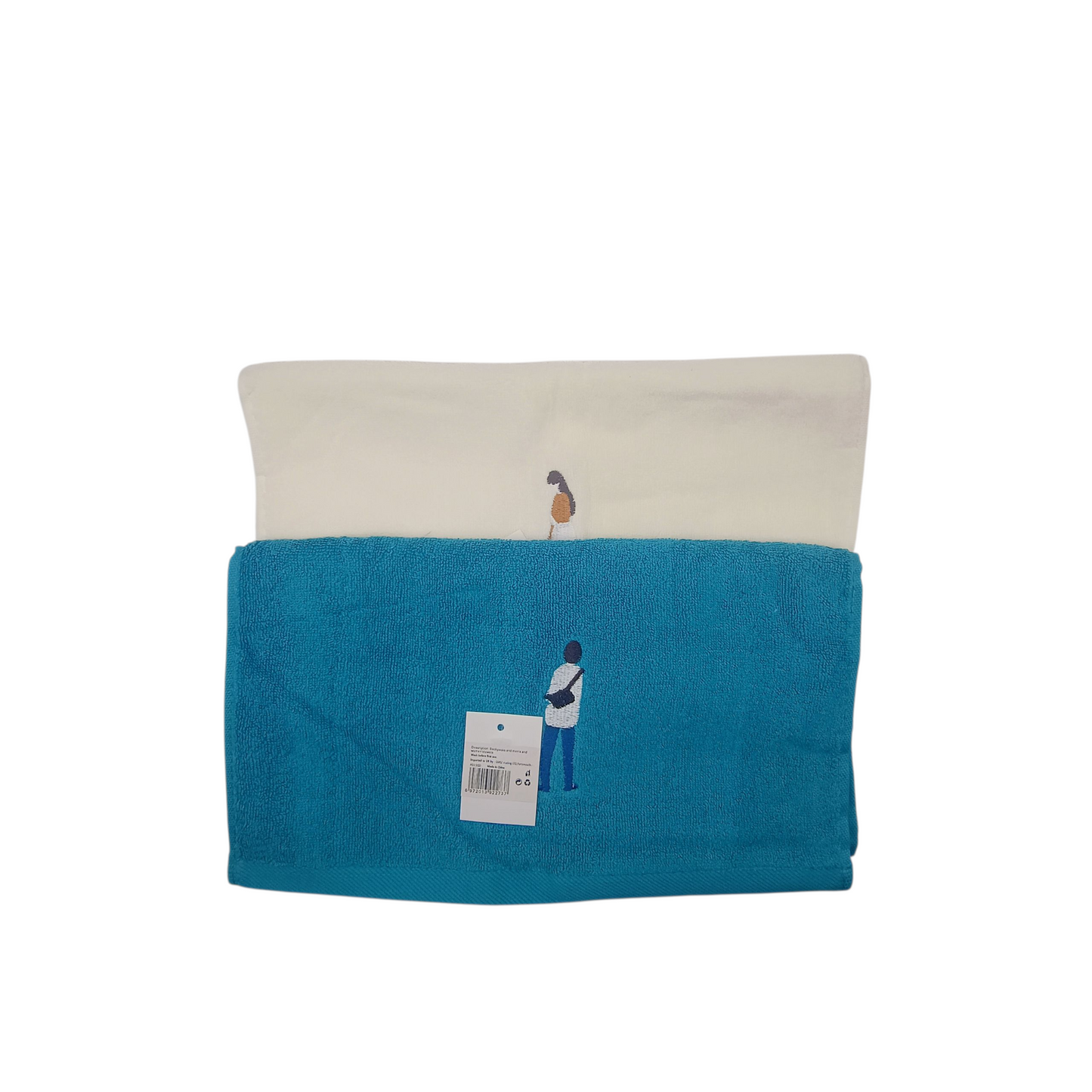 Folded blue and beige blanket with a small embroidered design on a white background