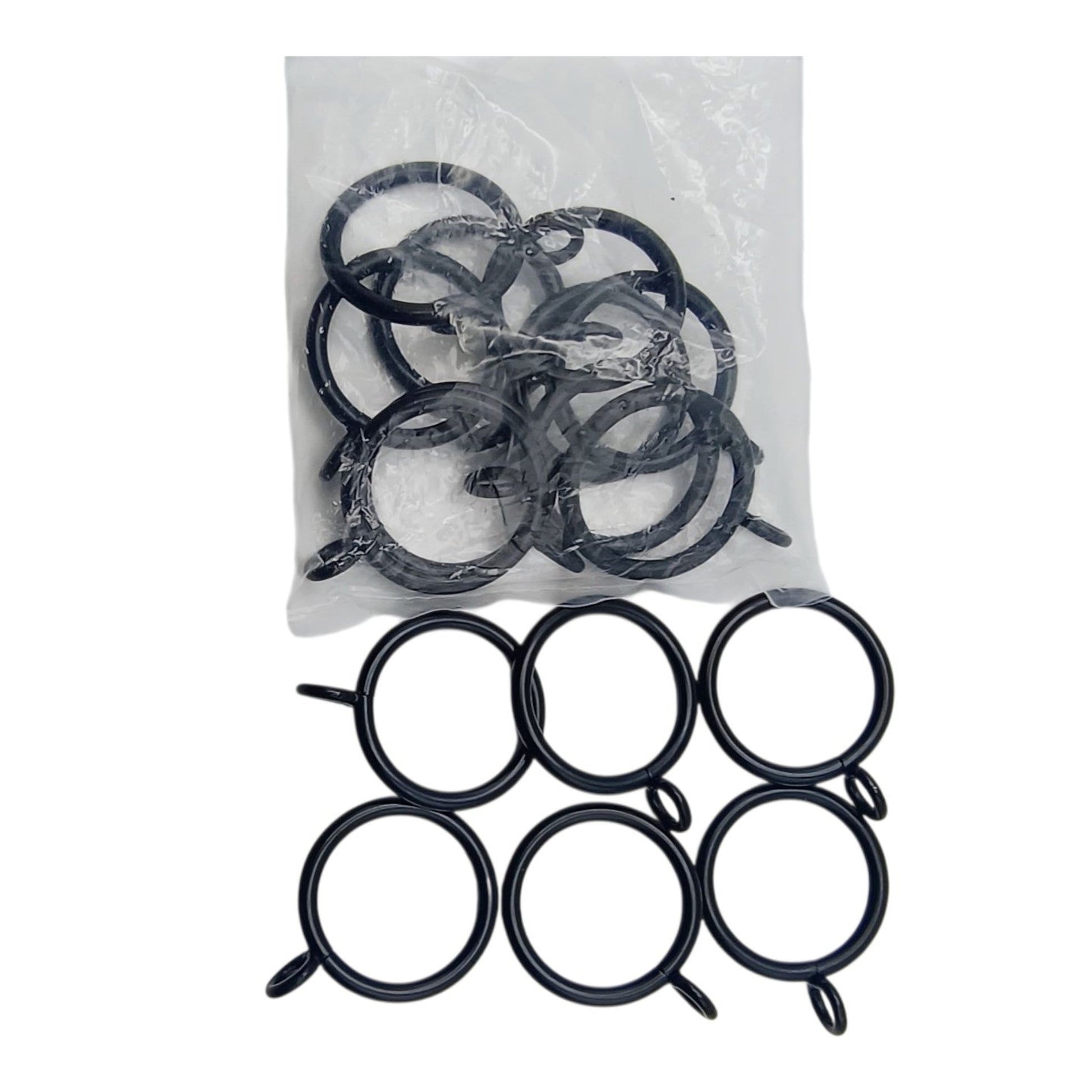 Set of black metal rings in a clear plastic bag on a white background