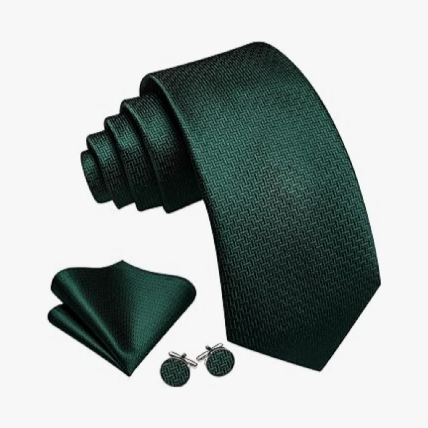 Green tie, pocket square, and cufflinks set on a white background