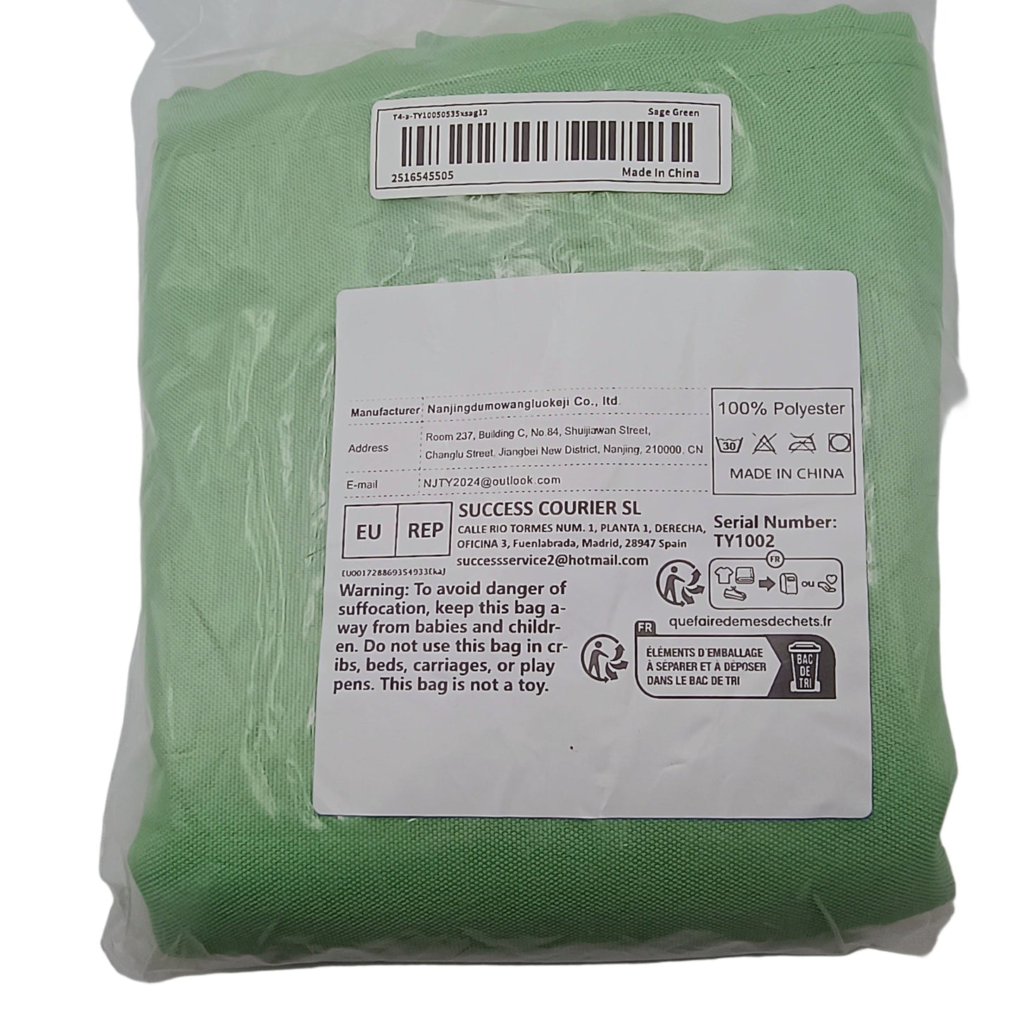 Green bag with labels on a white background