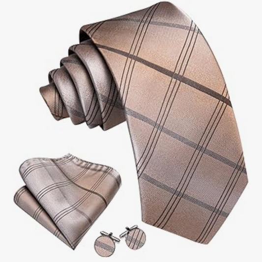 Plaid tie, pocket square, and cufflinks set on a white background